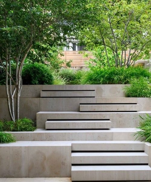 Wide open stairs with low planting and clear views up and down